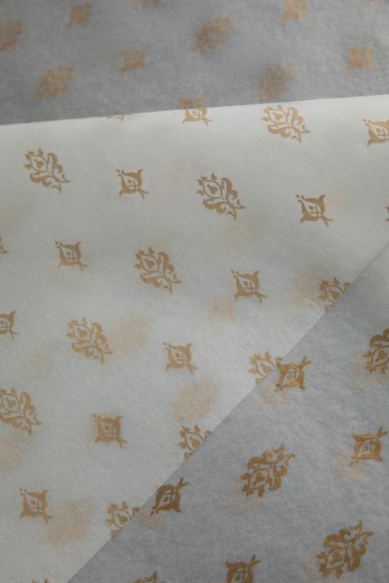 Seidenpapier-weiss-22gr-gold-bedruckt